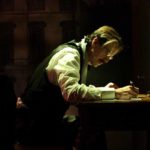 The Colonel (Robert Parsons) writes in his study. Photo: Laura Mason